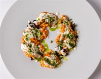 Risotto di pomodori alla brace, bufala, olive marinate e santoreggia montana